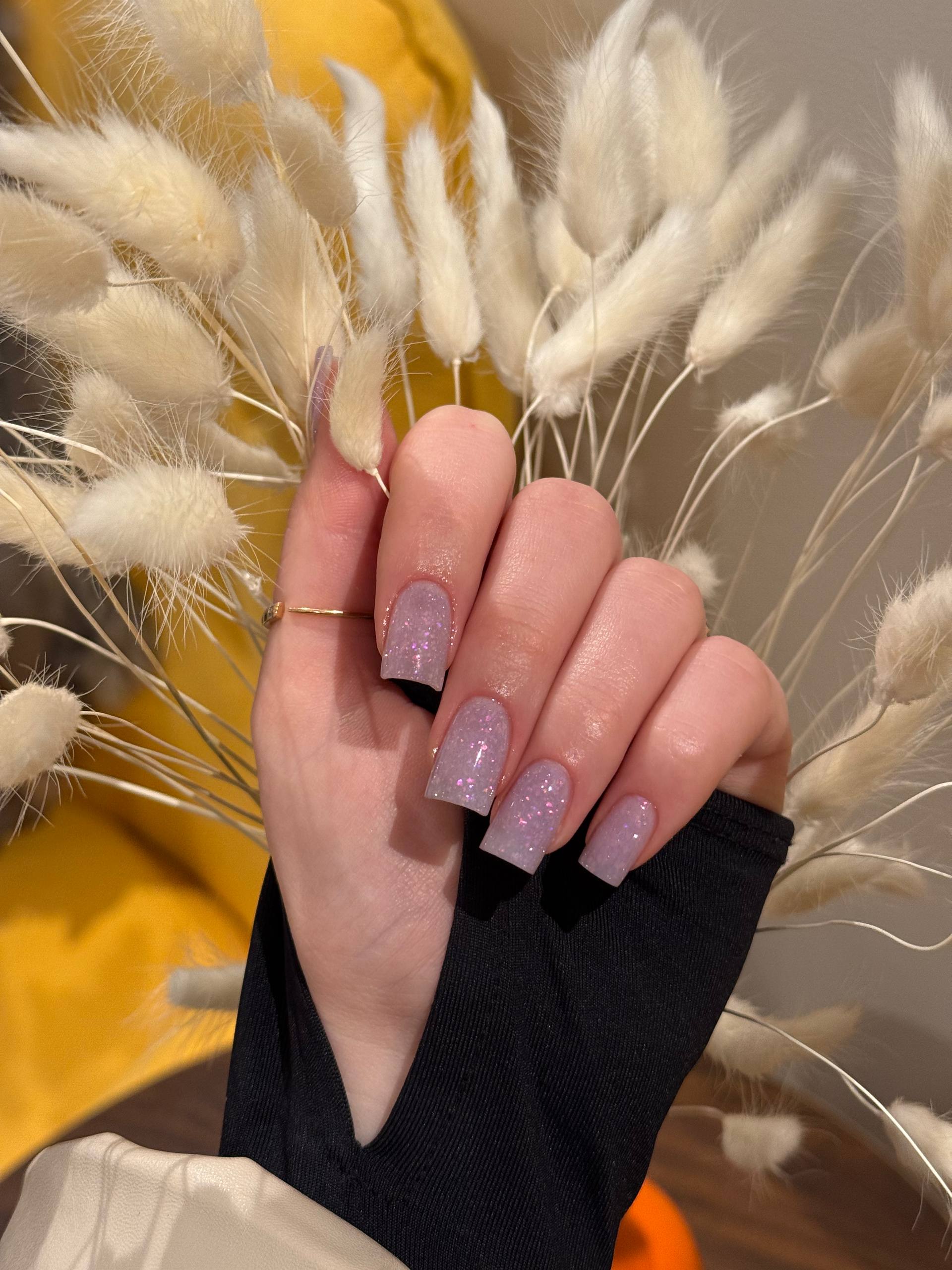 Lilac shimmer gel manicure with modern french tip
